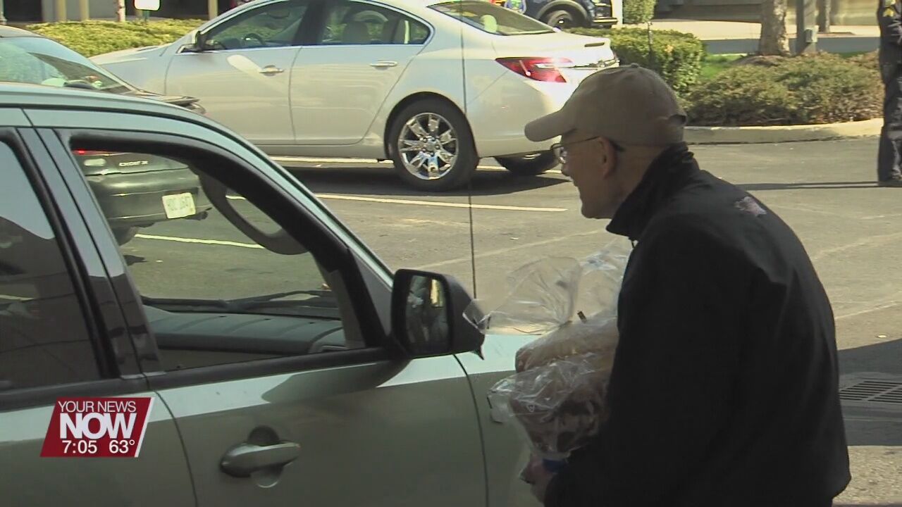 Tom Ahl Dealership holds drive-thru Easter dinners